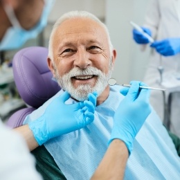 Senior man smiling during a dental exam