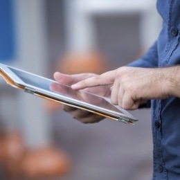 Person scrolling on a tablet